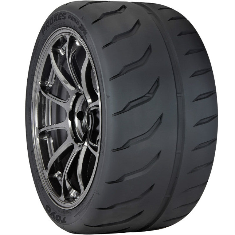 Toyo Proxes R888R competition tire showing the asymmetric tread pattern and 345/30ZR19 sidewall specs.
