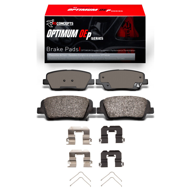 R1 Concepts OPTIMUM OEp rear brake pad set with included stainless steel hardware clips and lubricant.