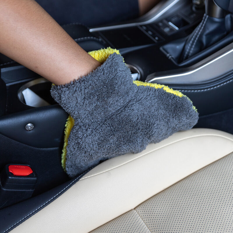 Green five-finger microfiber wash mitt designed for detailing automotive grilles and wheels.