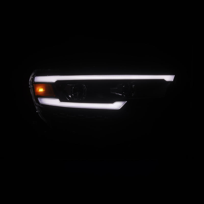 AlphaRex LUXX-Series black LED projector headlights with sequential signals for 2025-2026 Dodge Ram 1500.