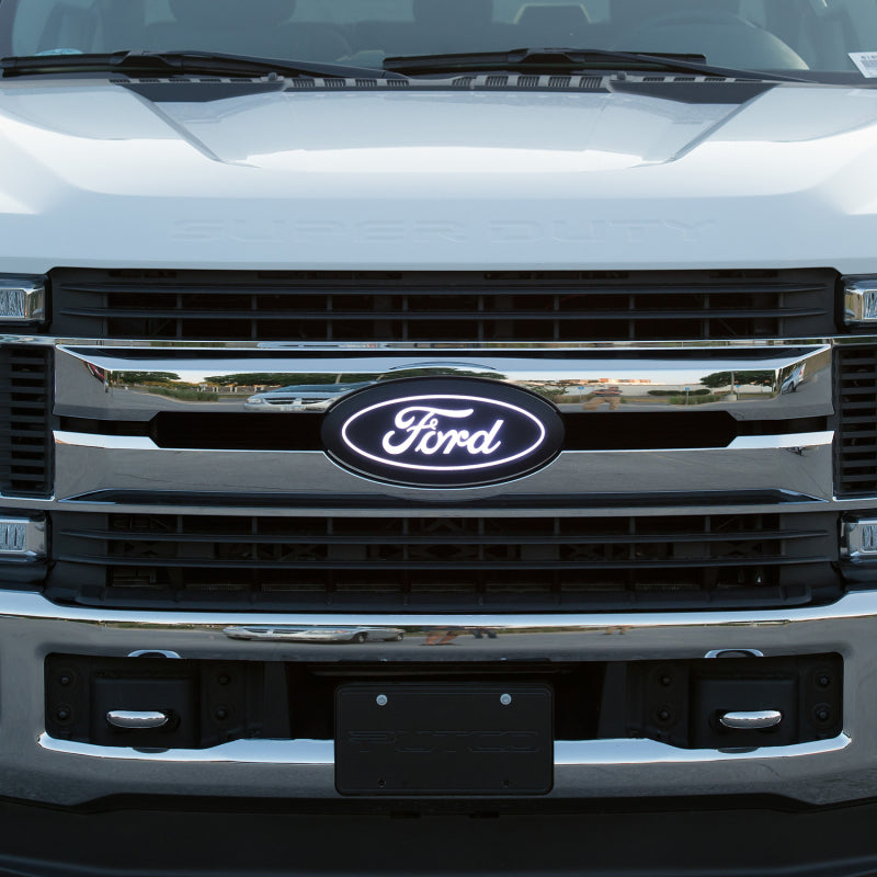 Putco Luminix matte black LED front grille emblem with center camera cutout for 2020-2022 Ford Super Duty trucks.