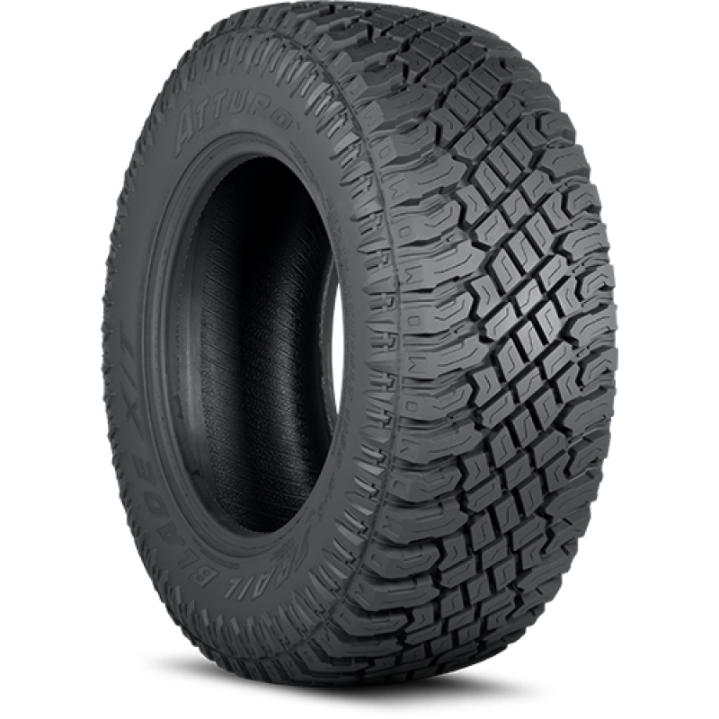Atturo Trail Blade X/T tire with aggressive mud-terrain shoulder blocks and all-terrain center tread pattern
