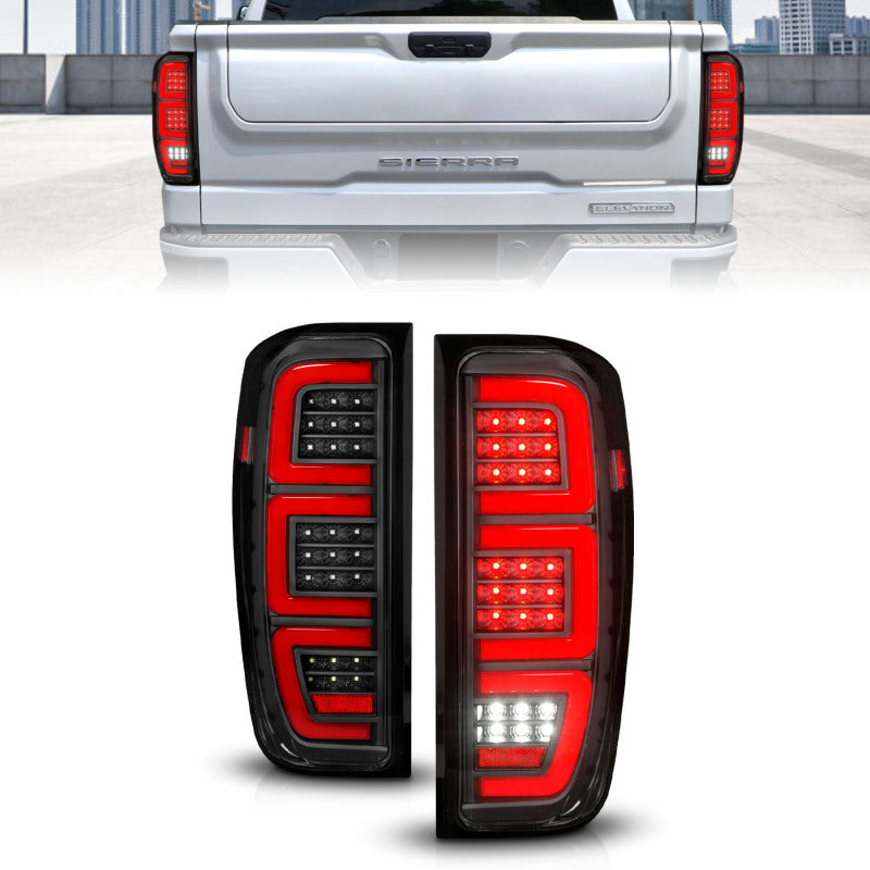 Pair of ANZO black housing replacement tail lights with integrated LED light bars for GMC Sierra trucks.