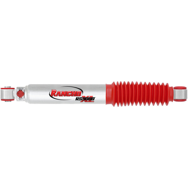 Rancho RS9000XL adjustable rear shock absorber with red protective boot and silver metallic finish