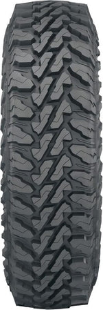 Yokohama Geolandar M/T G003 SXS mud-terrain tire showing aggressive tread blocks and reinforced sidewall lugs.