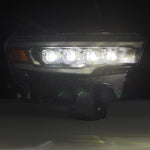 AlphaRex NOVA-Series black LED projector headlights for 2025-2026 Dodge Ram 1500 featuring multi-lens design.