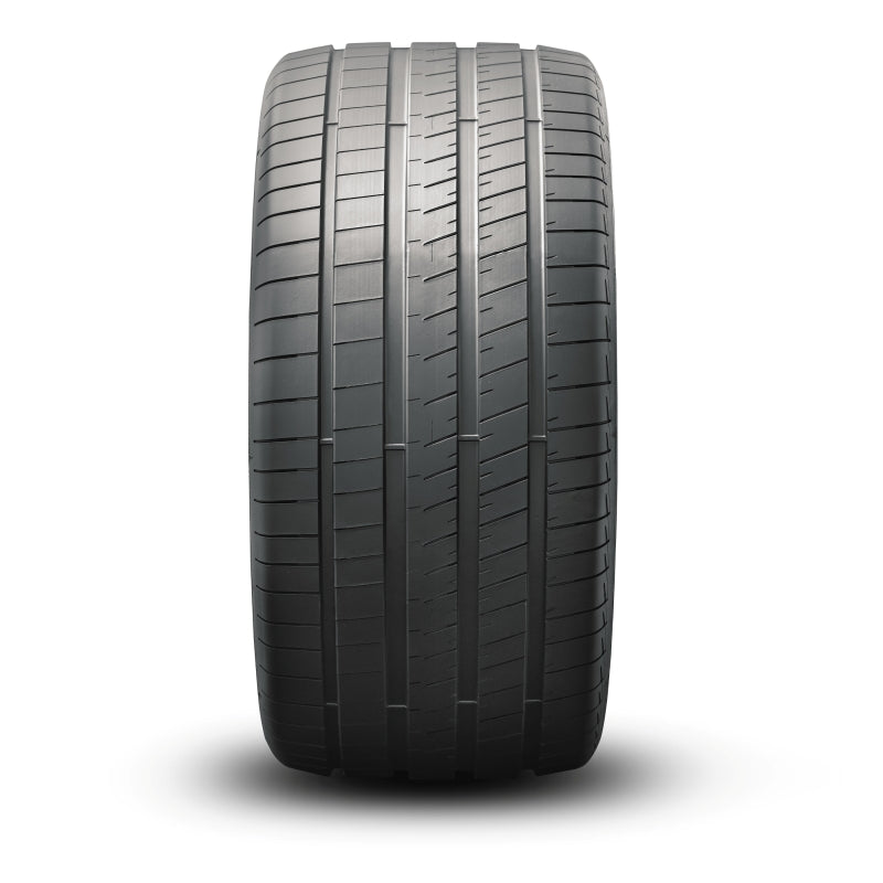 Mickey Thompson Street Comp GHT ultra-high performance tire showing directional tread and sidewall detail.