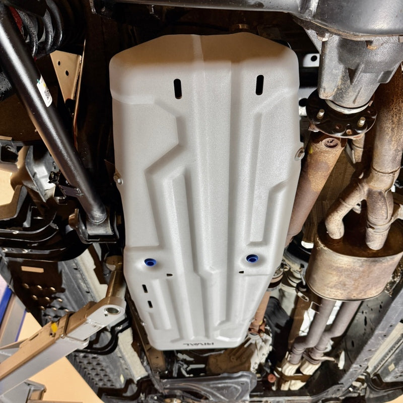 Rival silver aluminum gas tank skid plate for 2024-2026 Ford Ranger Raptor showing mounting holes and reinforced design.