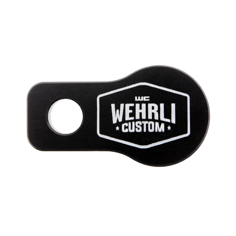 Black anodized billet aluminum coolant plug for 1.1 inch Duramax engine cover bores with red silicone O-ring.