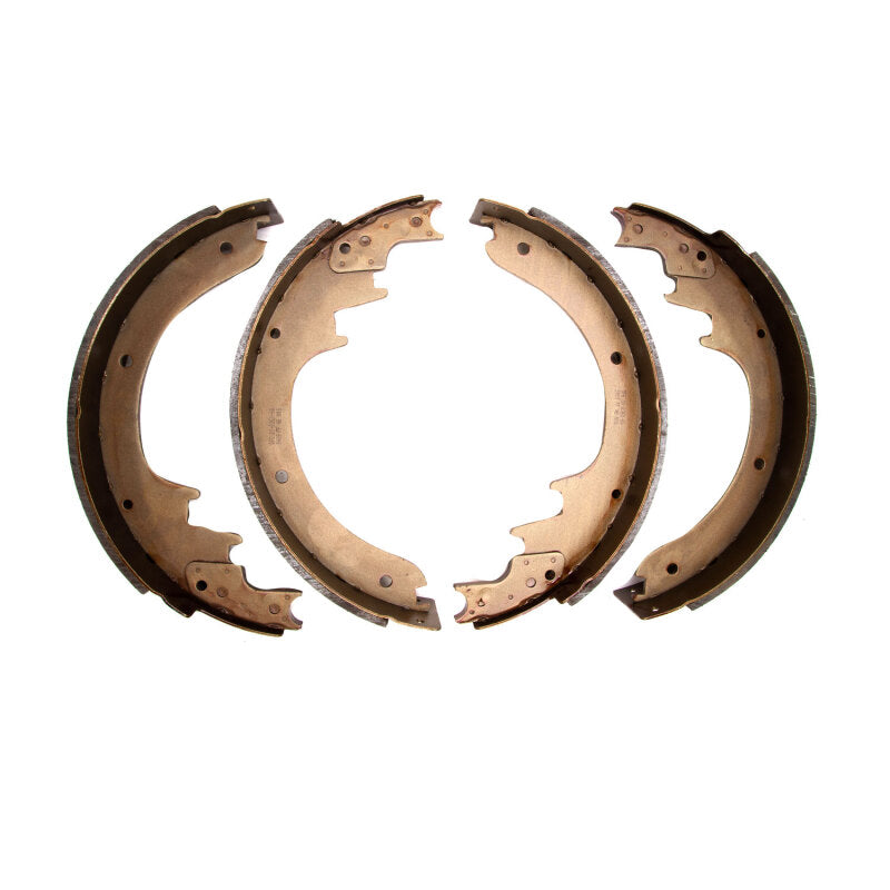 DFC Premium Service front semi-metallic brake shoes with black anti-rust coating and precision arc ground friction pads.