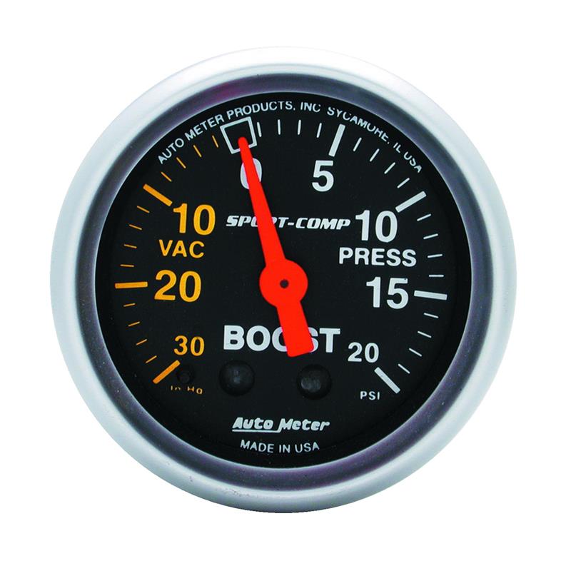 AutoMeter Sport-Comp 52mm mechanical boost and vacuum gauge with black face, white needle, and silver bezel.