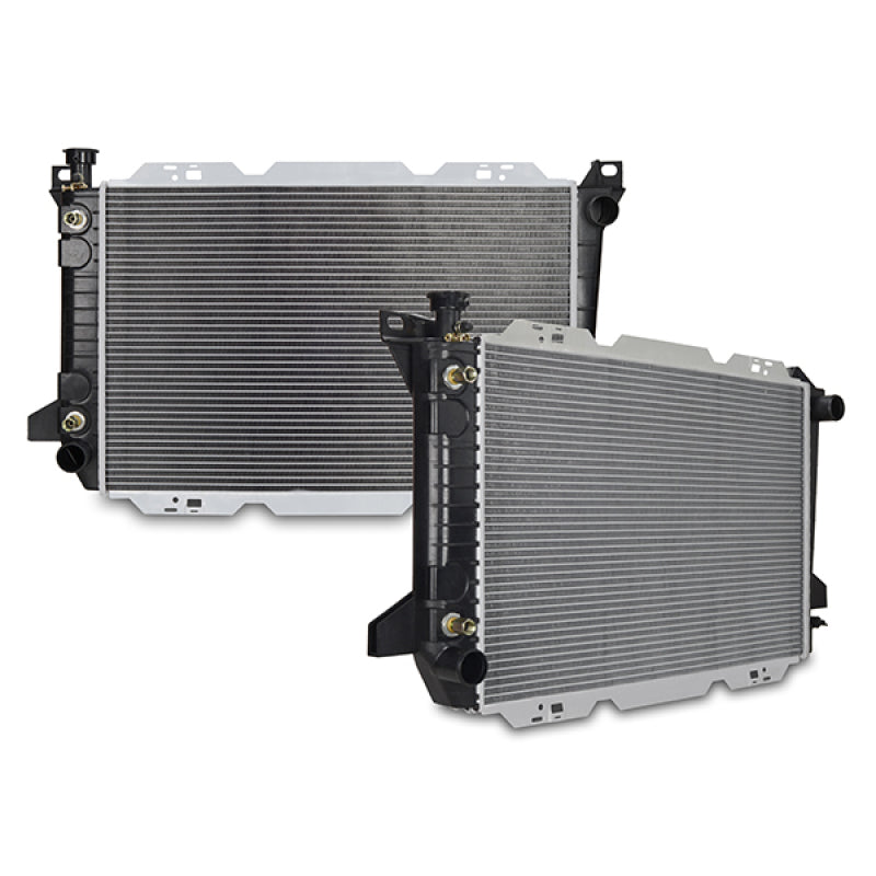 Mishimoto replacement radiator for 1985-1997 Ford trucks featuring an aluminum core and plastic end tanks.