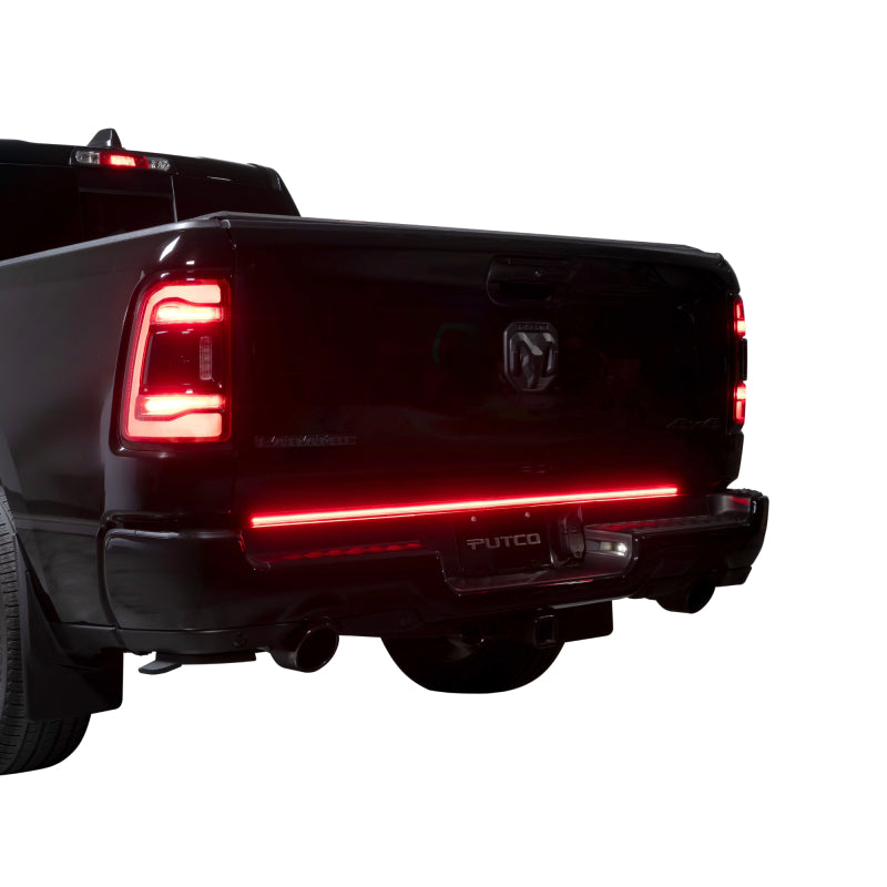 Putco 60-inch Blade LED tailgate light bar with direct-fit wiring harness and tinted polycarbonate housing.