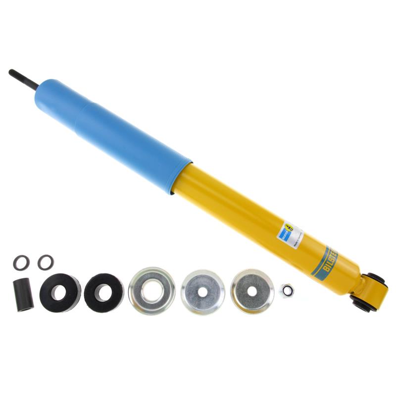 Bilstein B6 4600 Series yellow rear 46mm monotube shock absorber with blue dust boot for Mercedes-Benz G-Class SUVs.