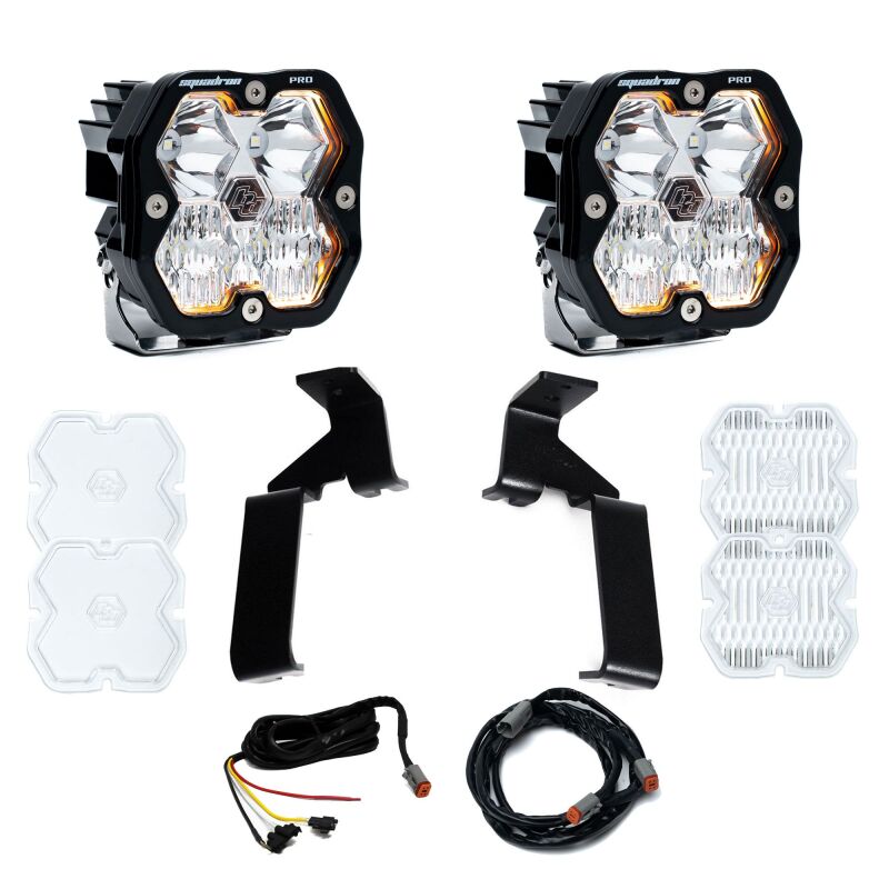 Baja Designs Squadron Pro 2.0 clear LED pods mounted on black A-pillar ditch light brackets for 2021-2026 Ford F-150.