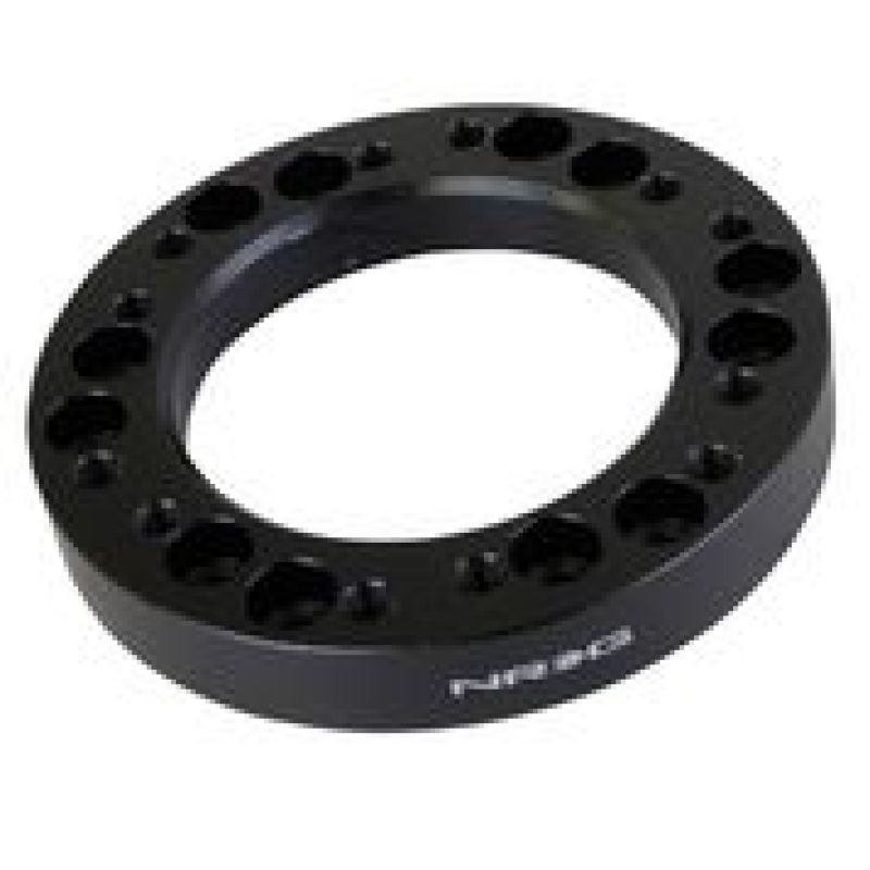NRG SRK-500B 1/2-inch black anodized aluminum steering wheel hub spacer with 6-bolt mounting pattern.
