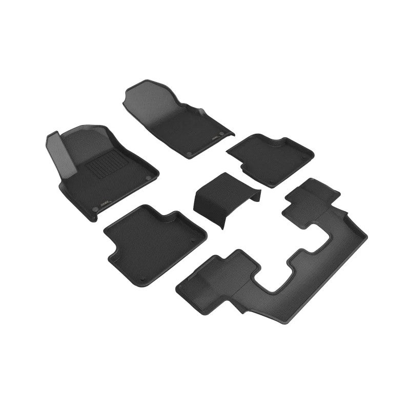3D MAXpider Kagu Series black all-weather floor mats with carbon fiber texture for Audi Q7 and Q8.
