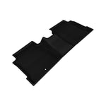 Black 3D MAXpider Kagu Series second row floor mats with carbon fiber texture and precision-molded raised edges.