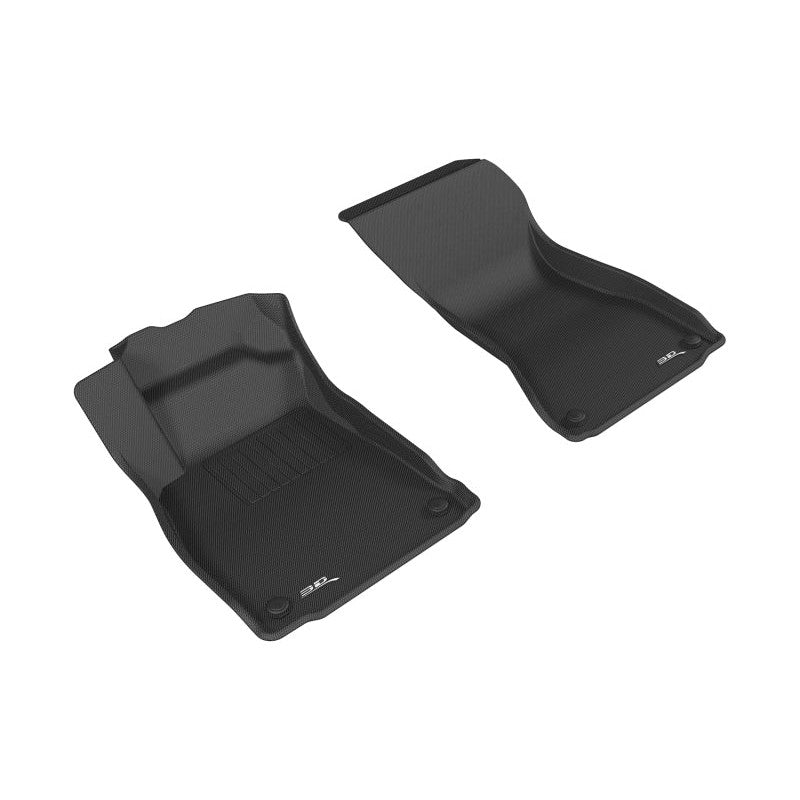 Black 3D MAXpider Kagu Series 1st row floor mats with carbon fiber texture and raised edges for Audi vehicles.
