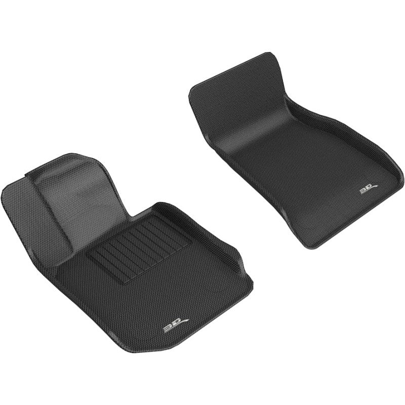 3D MAXpider Kagu Series black 1st row floor mats with carbon fiber texture and MAXpider anti-skid backing.