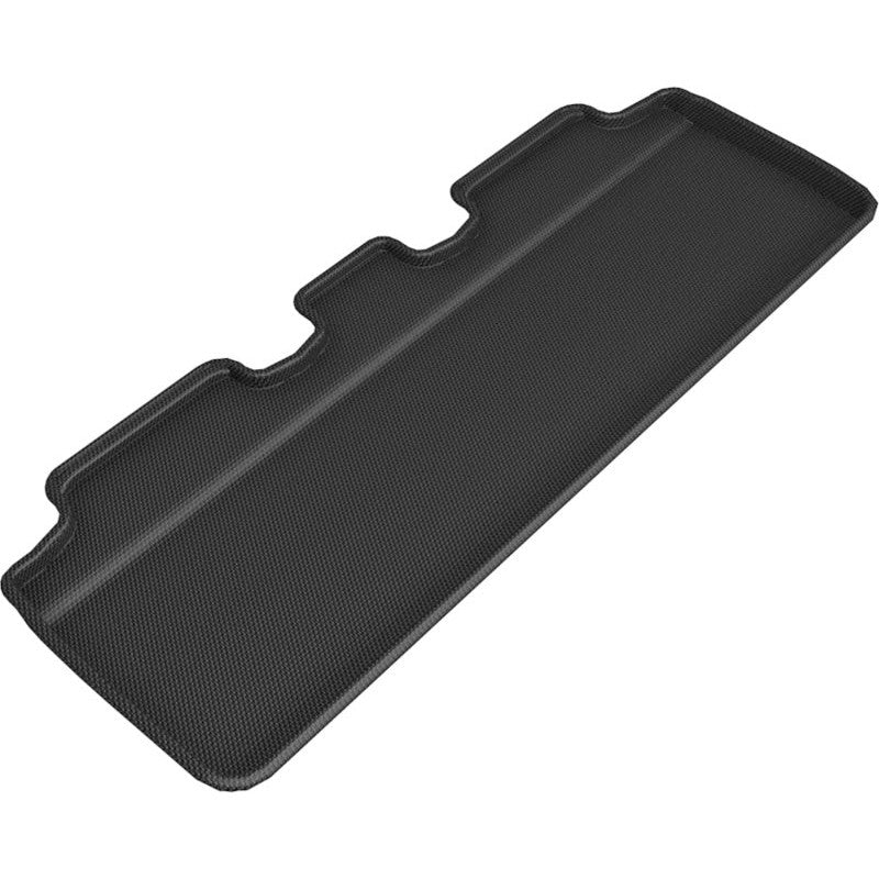 3D MAXpider Kagu Series black second row floor mat for Tesla Model Y showing carbon fiber texture and raised edges.
