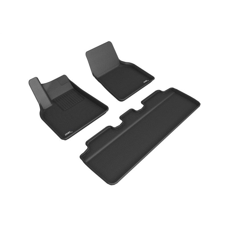 3D MAXpider KAGU Series black floor mats for Tesla Model Y with carbon fiber texture and raised edges.