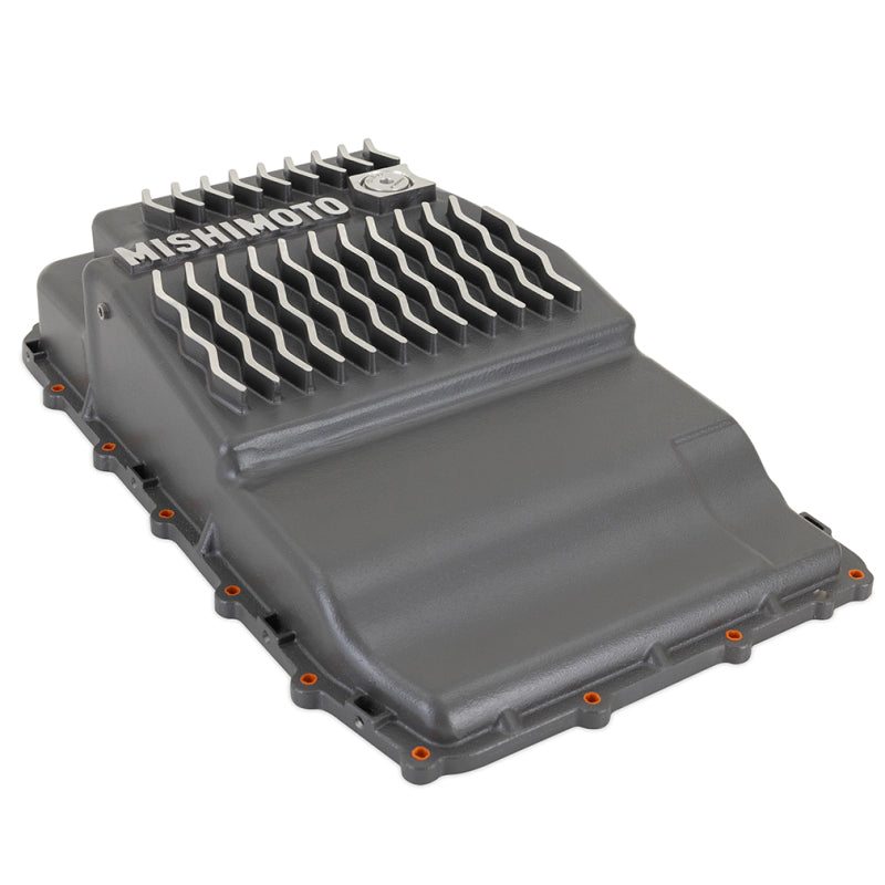 Gunmetal Gray Mishimoto cast aluminum transmission pan with cooling fins, internal baffles, and pre-installed bolts.