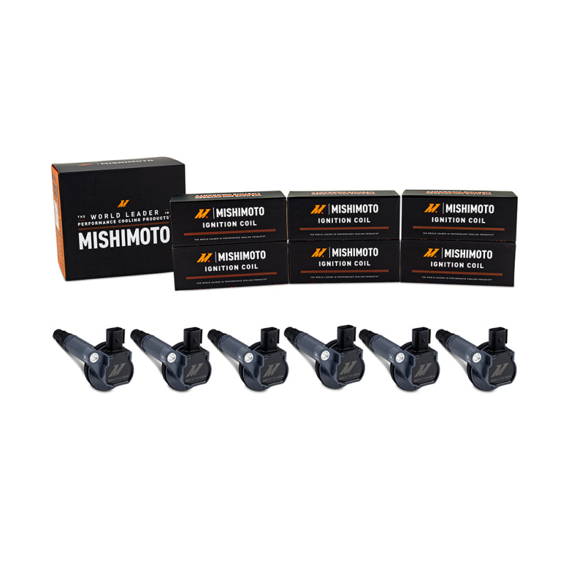 Set of six Mishimoto ignition coils with black housings and integrated mounting tabs for Ford 3.7L engines