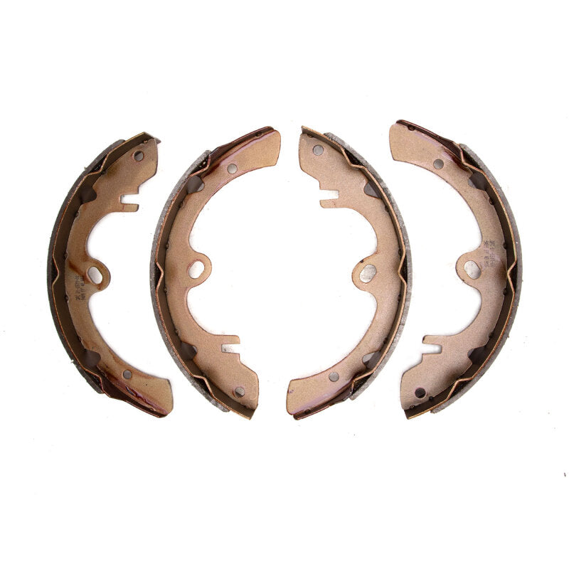 DFC Premium Service rear brake shoes with semi-metallic friction material and black anti-rust finish.
