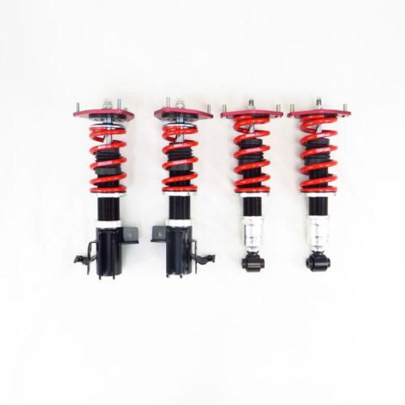 RS-R Sports-i Club Racer adjustable coilover suspension kit featuring red springs and performance-tuned dampers.