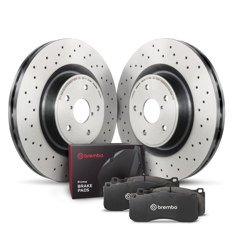 Brembo front disc brake kit including high carbon rotors and Prime low-met brake pads for Porsche models.