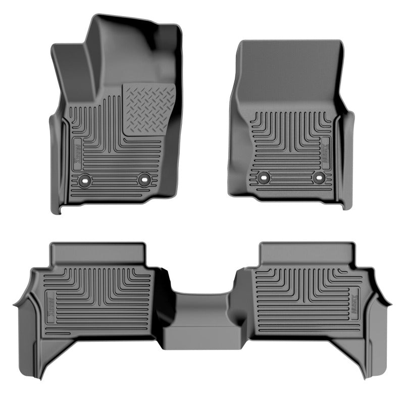 Black Husky Liners Weatherbeater front and second-row floor liners for 2024-2026 Toyota Tacoma.