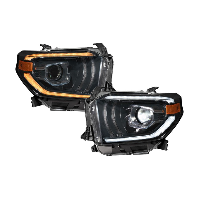 Form Lighting LED projector headlights for 2014-2021 Toyota Tundra featuring dual white DRL bars and black housings.