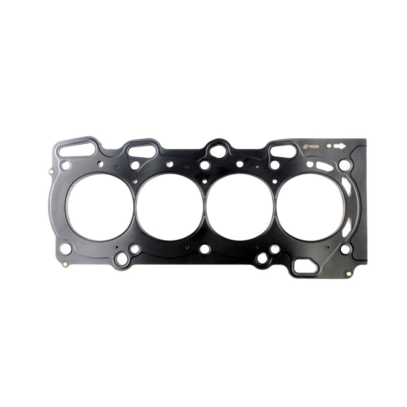 Cometic MLX Multi-Layer Steel head gasket for Toyota 2ZZ-GE engine showing 82.5mm bore cutouts and Viton coating.