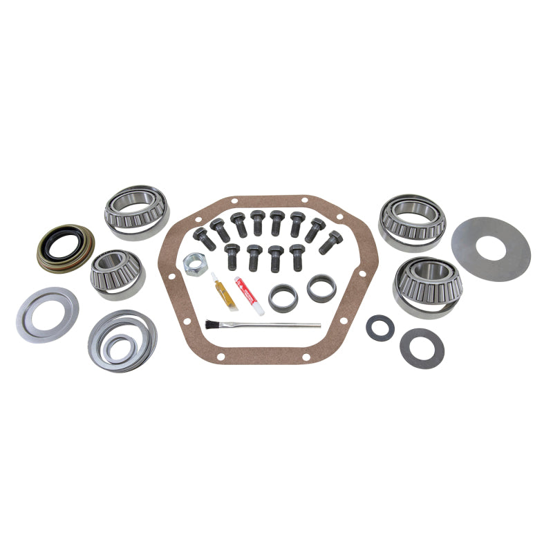 Yukon Gear Master Overhaul Kit YK D60-R featuring Timken bearings, pinion seal, shims, and marking compound.