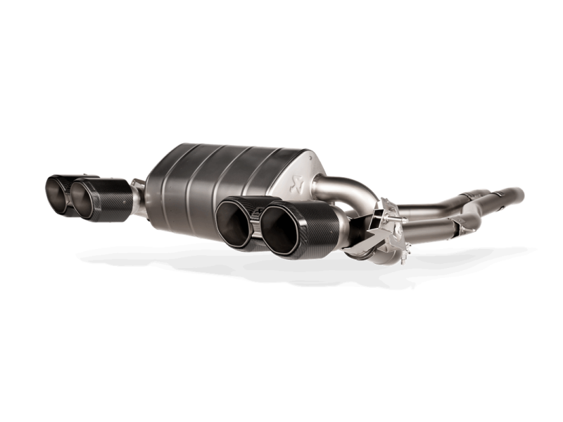 Akrapovic titanium slip-on exhaust system featuring cast valve housings and dual outlets for 2023 BMW M2 G87.