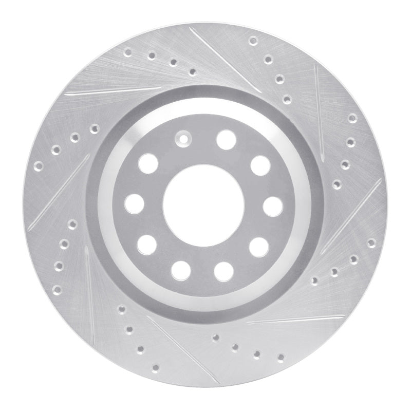 Silver zinc-plated rear right brake rotor with cross-drilled holes and machined slots for Audi and Volkswagen vehicles.