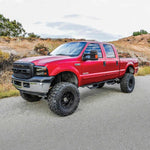 Westin Outlaw Drop Nerf Step Bars; 1.5in Tube; Textured Black - Fits 1999-2016 Ford F-250/F-350 Super Duty Crew Cab