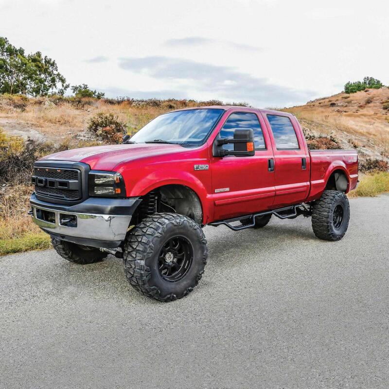 Westin Outlaw Drop Nerf Step Bars; 1.5in Tube; Textured Black - Fits 1999-2016 Ford F-250/F-350 Super Duty Crew Cab