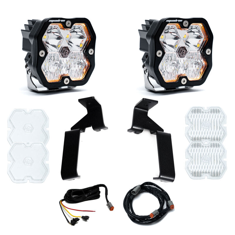 Baja Designs Squadron Sport 2.0 clear driving/combo LED lights on 2021-2026 Ford F-150 A-pillar brackets.