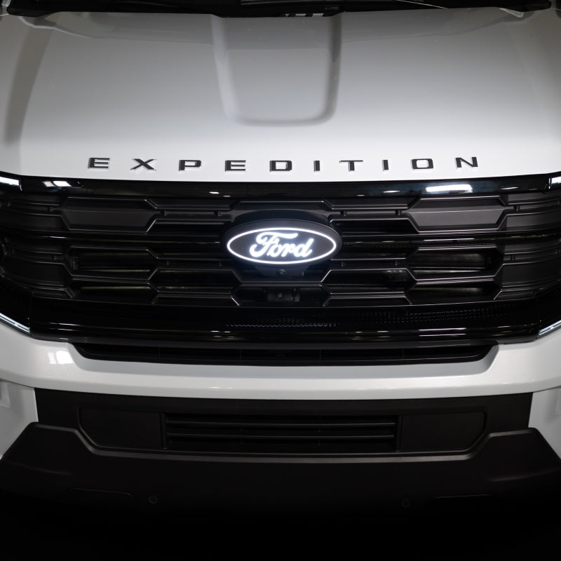 Putco Luminix matte black front grille LED emblem with 6500K white illumination for a 2025 Ford Expedition.