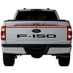Putco Excalibur LED tailgate light bar with red jeweled housing and sealed polycarbonate enclosure.