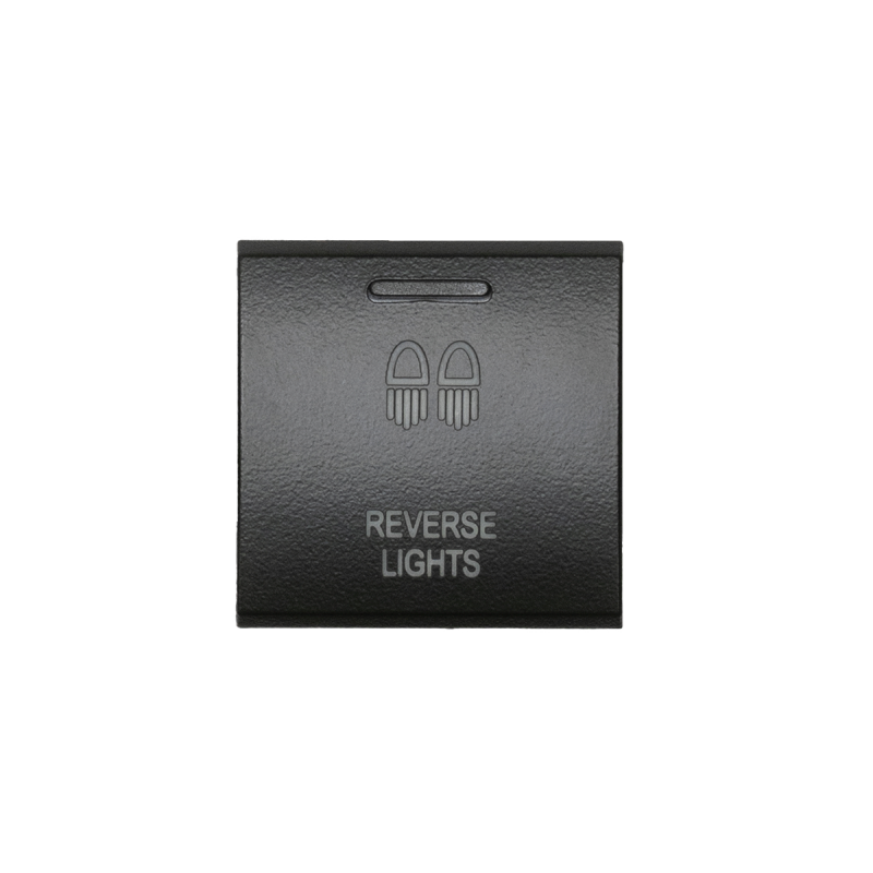 Cali Raised LED square Toyota OEM-style dashboard switch for auxiliary reverse lights featuring a backlit icon.
