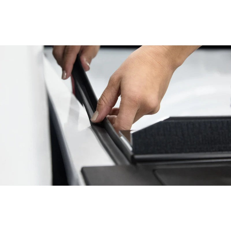 Black adhesive-backed Element Seal gasket roll for universal truck bed and tonneau cover weatherproofing.