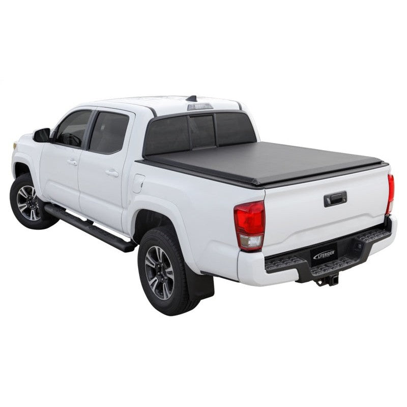 Access Literider black vinyl roll-up tonneau cover installed on a Toyota Tundra with 5.5ft bed and deck rail system.