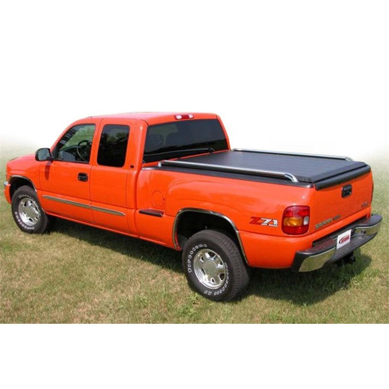 Access Literider roll-up tonneau cover on a Chevrolet Silverado stepside bed with storage straps and locking system.