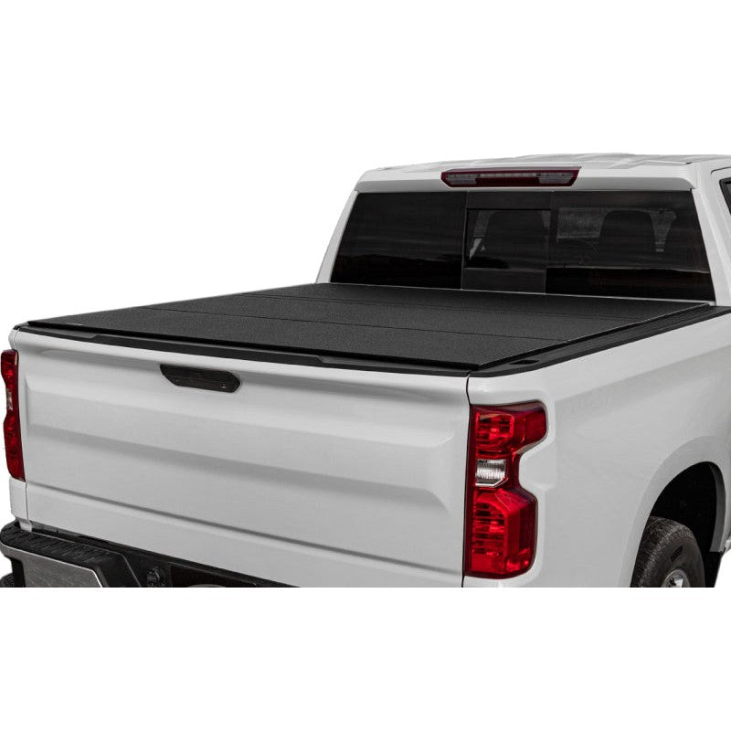 Black urethane finish Access LOMAX folding hard tonneau cover installed on a 2023-2025 Chevrolet Colorado truck bed