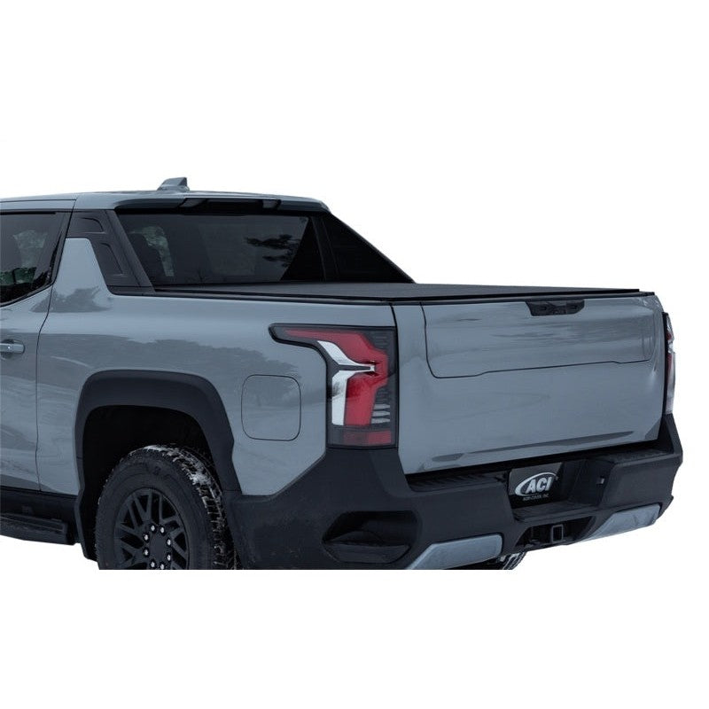 Access LOMAX Stance hard folding tonneau cover installed on a 5ft 11in truck bed in a vertical open position.