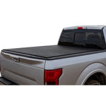 Access LOMAX black hard tri-fold tonneau cover installed on a 2022-2025 Nissan Frontier with 5ft bed