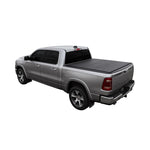 Access LOMAX black urethane hard tri-fold tonneau cover installed on a Ram 1500 truck bed with a 5' 7" box.